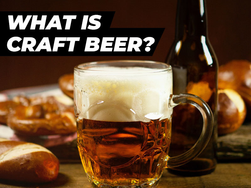 What Is Craft Beer - Small Stein of Beer with Beer Bottle and Bread in the Background